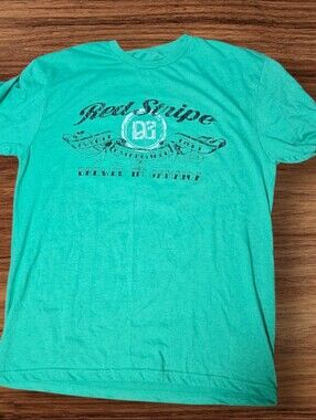 Red Stripe Men’s Kelly Green Tattoo Inspired Graphic T‑Shirt